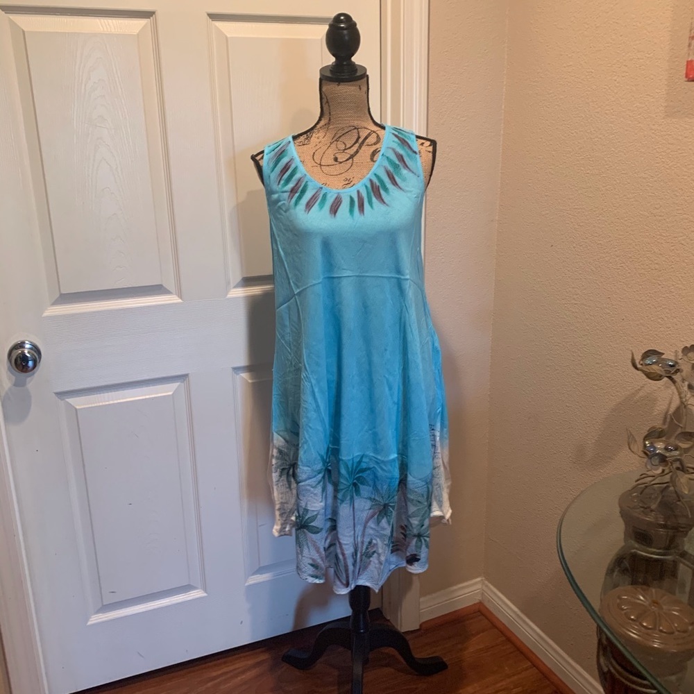 Light blue umbrella dress with palm trees